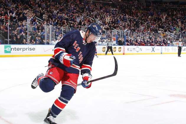 NEW YORK, NY - DECEMBER 23:  J.T. Miller #10 of the New York Rangers celebrates after his third period goal against the against the Toronto Maple Leafs at Madison Square Garden on December 23, 2013 in New York City. (Photo by Scott Levy/NHLI via Getty Images)