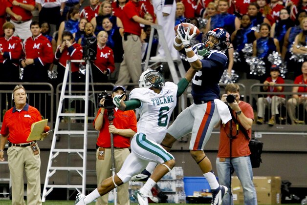 September 22, 2012; New Orleans, LA, USA; Tulane Green Wave cornerback Lorenzo Doss (6) breaks up a pass to Ole Miss Rebels wide receiver Donte Moncrief (12) during the first quarter of a game at the Mercedes-Benz Superdome. Mandatory Credit: Derick E. Hingle-USA TODAY Sports September 22, 2012; New Orleans, LA, USA; Tulane Green Wave cornerback Lorenzo Doss (6) breaks up a pass to Ole Miss Rebels wide receiver Donte Moncrief (12) during the first quarter of a game at the Mercedes-Benz Superdome. Mandatory Credit: Derick E. Hingle-USA TODAY Sports