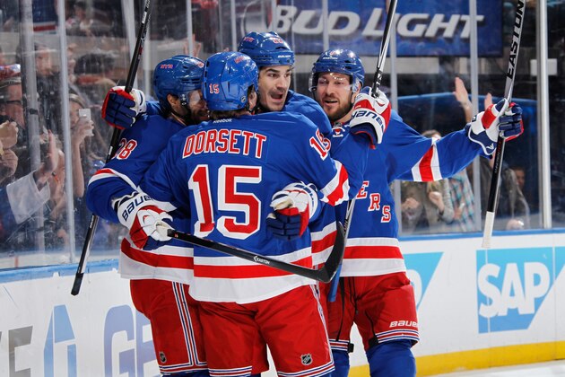 NEW YORK, NY - MARCH 26:  Derek Dorsett #15, Brian Boyle #22, and Kevin Klein #8 of the New York Rangers celebrate after a first-period goal against the Philadelphia Flyers at Madison Square Garden on March 26, 2014 in New York City. (Photo by Scott Levy/NHLI via Getty Images)