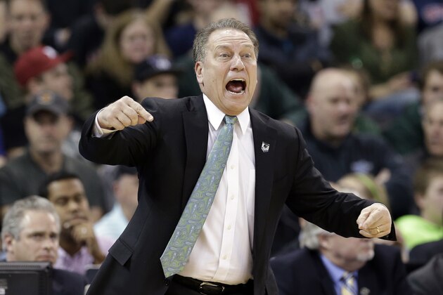 Michigan State head coach Tom Izzo yells toward the court against Harvard in the first half during the third round of the NCAA men's college basketball tournament in Spokane, Wash., Saturday, March 22, 2014. (AP Photo/Elaine Thompson)