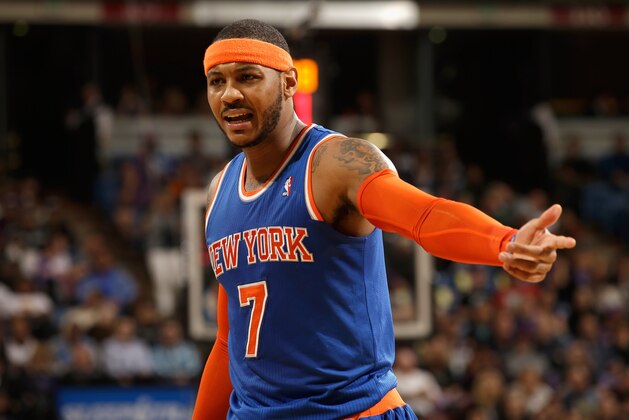 SACRAMENTO, CA - MARCH 26:  Carmelo Anthony #7 of the New York Knicks complains about a call during their game against the Sacramento Kings at Sleep Train Arena on March 26, 2014 in Sacramento, California. NOTE TO USER: User expressly acknowledges and agrees that, by downloading and or using this photograph, User is consenting to the terms and conditions of the Getty Images License Agreement.  (Photo by Ezra Shaw/Getty Images)