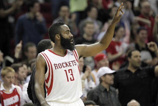 Mar 7, 2014; Houston, TX, USA; Houston Rockets shooting guard James Harden (13) reacts to a play during the third quarter against the Indiana Pacers at Toyota Center. Mandatory Credit: Andrew Richardson-USA TODAY Sports