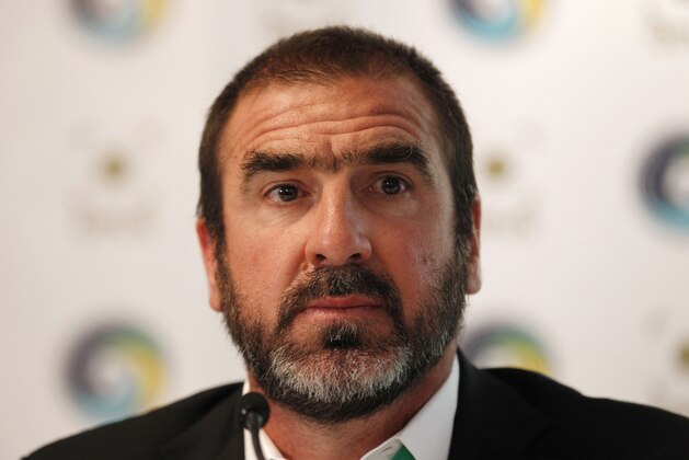 Soccer legends, New York Cosmos' Director of Soccer Eric Cantona looks on during the announcement of the New York Cosmos Opus in London, Tuesday, Aug. 2, 2011. The New York Cosmos Opus is the definitive publication on one of the world's most glamorous soccer franchises. New York Cosmos is due to play Manchester United in a Paul Scholes testimonial match at Old Trafford on Friday, the first U.S. team to play at the stadium. (AP Photo/Sang Tan)