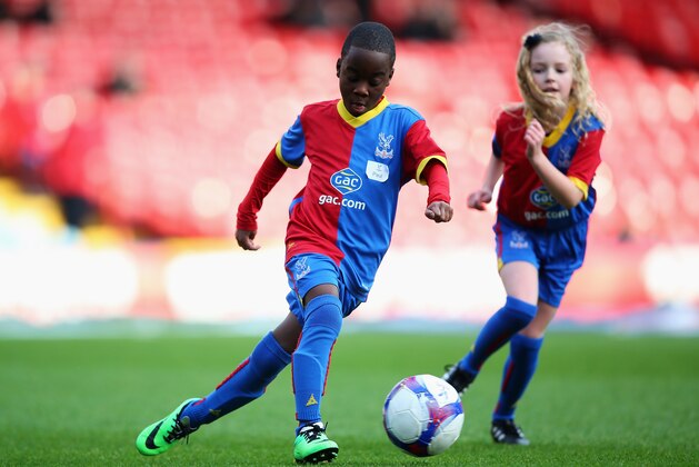 LONDON, ENGLAND - JANUARY 18:  Crystal Palace mascots warm up prior to the Barclays Premier League match between Crystal Palace and Stoke City at Selhurst Park on January 18, 2014 in London, England.  (Photo by Clive Rose/Getty Images)