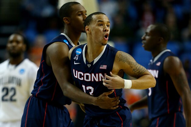 BUFFALO, NY - MARCH 22: Shabazz Napier #13 of the Connecticut Huskies reacts against the Villanova Wildcats during the third round of the 2014 NCAA Men's Basketball Tournament at the First Niagara Center on March 22, 2014 in Buffalo, New York.  (Photo by Elsa/Getty Images)