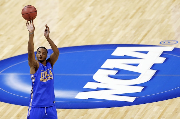 UCLA guard Norman Powell works out during practice at the NCAA college basketball tournament, Wednesday, March 26, 2014, in Memphis, Tenn. UCLA plays Florida in a regional semifinal on Thursday. (AP Photo/John Bazemore) UCLA guard Norman Powell works out during practice at the NCAA college basketball tournament, Wednesday, March 26, 2014, in Memphis, Tenn. UCLA plays Florida in a regional semifinal on Thursday. (AP Photo/John Bazemore)