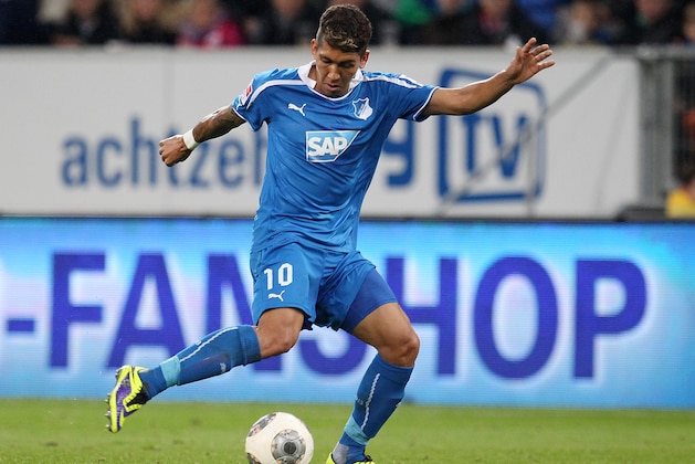 Hoffenheim's Roberto Firmino of Brazil kicks  the ball during a German first division Bundesliga soccer match between TSG 1899 Hoffenheim and Bayern Munich in Sinsheim, Germany, Saturday, Nov.2, 2013. (AP Photo/Michael Probst)