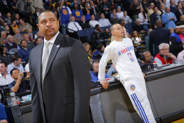 OAKLAND, CA - FEBRUARY 10: Head Coach Mark Jackson of the Golden State Warriors coaches against the Philadelphia 76ers on February 10, 2014 at Oracle Arena in Oakland, California. NOTE TO USER: User expressly acknowledges and agrees that, by downloading and or using this photograph, user is consenting to the terms and conditions of Getty Images License Agreement. Mandatory Copyright Notice: Copyright 2014 NBAE (Photo by Rocky Widner/NBAE via Getty Images)