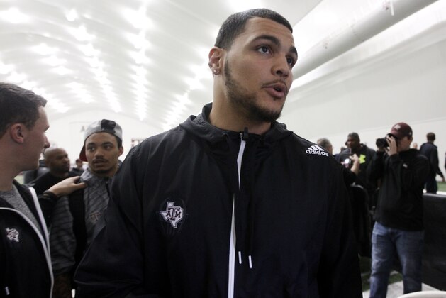 Texas A&M receiver Mike Evans leaves Texas A&M's pro day held Wednesday, March 5, 2014, in College Station, Texas. Evans did not compete in the pro day. (AP Photo/Patric Schneider)