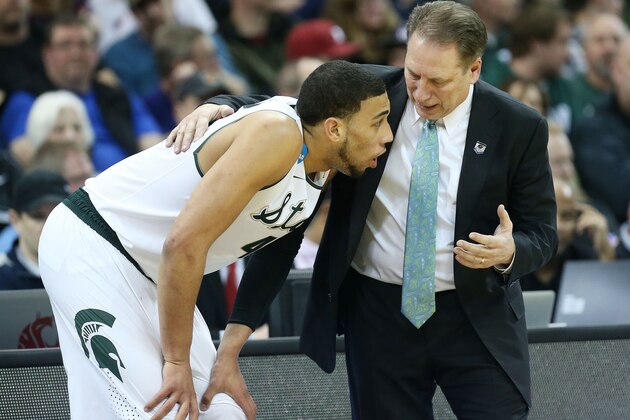 SPOKANE, WA - MARCH 22:  Head coach Tom Izzo talks to Denzel Valentine #45 of the Michigan State Spartans in the second half against the Harvard Crimson during the Third Round of the 2014 NCAA Basketball Tournament at Spokane Veterans Memorial Arena on March 22, 2014 in Spokane, Washington.  (Photo by Stephen Dunn/Getty Images)