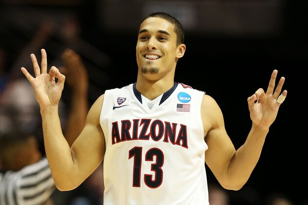 SAN DIEGO, CA - MARCH 23:  Nick Johnson #13 of the Arizona Wildcats celebrates in the second half of their 84 to 61 win over the Gonzaga Bulldogs during the third round of the 2014 NCAA Men's Basketball Tournament at Viejas Arena on March 23, 2014 in San Diego, California.  (Photo by Jeff Gross/Getty Images)