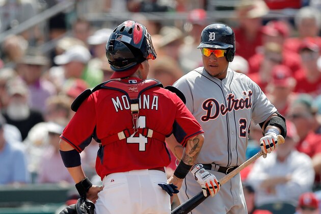 JUPITER, FL - MARCH 10:  Miguel Cabrera #24 of the Detroit Tigers speaks to Yadier Molina #4 of the St. Louis Cardinals following a third inning home run during a game at Roger Dean Stadium on March 10, 2014 in Jupiter, Florida.  (Photo by Stacy Revere/Getty Images)