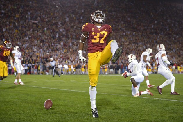 Southern California running back Javorius Allen celebrates a touchdown during the first half of an NCAA college football game against Stanford, Saturday, Nov. 16, 2013, in Los Angeles. (AP Photo/Mark J. Terrill)