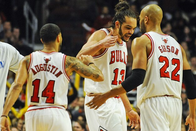 Feb 11, 2014; Chicago, IL, USA; Chicago Bulls point guard D.J. Augustin (14), Chicago Bulls center Joakim Noah (13) and Chicago Bulls power forward Taj Gibson (22) celebrate scoring in the second half against the Atlanta Hawks at the United Center. The Bulls beat the Hawks 100-85. Mandatory Credit: Matt Marton-USA TODAY Sports Feb 11, 2014; Chicago, IL, USA; Chicago Bulls point guard D.J. Augustin (14), Chicago Bulls center Joakim Noah (13) and Chicago Bulls power forward Taj Gibson (22) celebrate scoring in the second half against the Atlanta Hawks at the United Center. The Bulls beat the Hawks 100-85. Mandatory Credit: Matt Marton-USA TODAY Sports