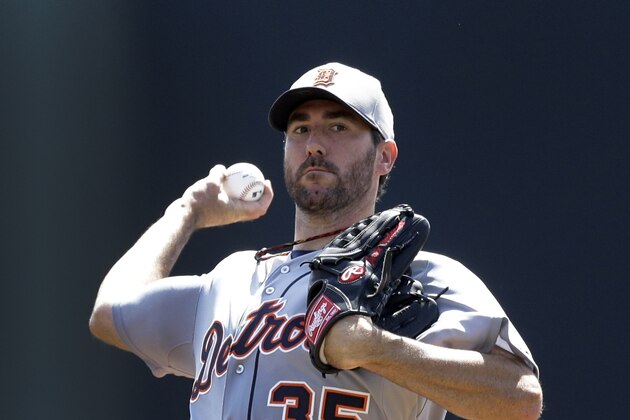 Detroit Tigers starting pitcher Justin Verlander throws during the first inning of a spring exhibition baseball game against the Atlanta Braves in Kissimmee, Fla., Friday, March 21, 2014. (AP Photo/Carlos Osorio)