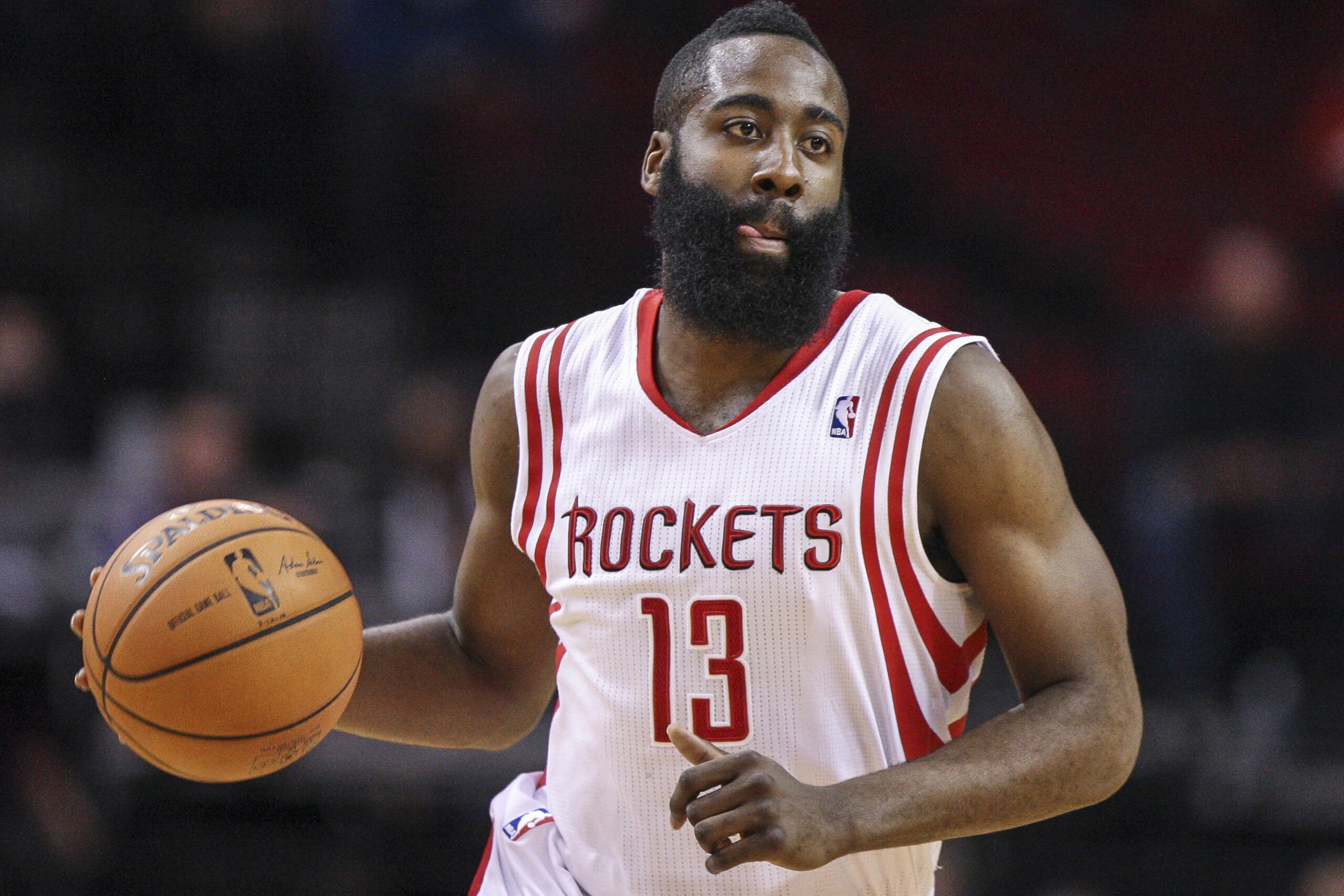 Mar 27, 2014; Houston, TX, USA; Houston Rockets guard James Harden (13) brings the ball up the court during the first quarter against the Philadelphia 76ers at Toyota Center. Mandatory Credit: Troy Taormina-USA TODAY Sports