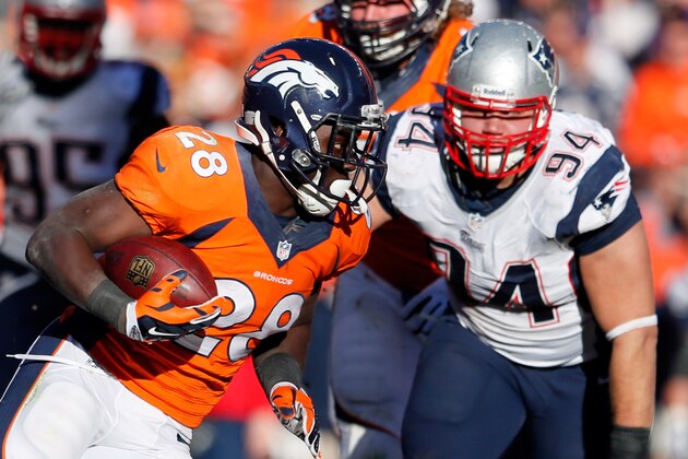 DENVER, CO - JANUARY 19:   Montee Ball #28 of the Denver Broncos breaks a tackle against Chris Jones #94 of the New England Patriots during the AFC Championship game at Sports Authority Field at Mile High on January 19, 2014 in Denver, Colorado.  (Photo by Kevin C. Cox/Getty Images)