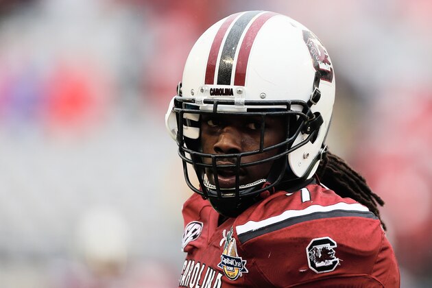 ORLANDO, FL - JANUARY 01:  Jadeveon Clowney #7 of the South Carolina Gamecocks works out on the field before the start of their game against the Wisconsin Badgers at the Capital One Bowl on January 1, 2014 in Orlando, Florida.  (Photo by Scott Halleran/Getty Images)