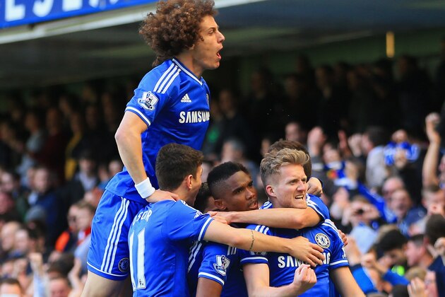 LONDON, ENGLAND - MARCH 22:  Andre Schurrle of Chelsea celebrates scoring his second goal with,  David Luiz, Samuel Eto'o, Oscar, Branislav Ivanovic of Chelsea during the Barclays Premier League match between Chelsea and Arsenal at Stamford Bridge on March 22, 2014 in London, England.  (Photo by Richard Heathcote/Getty Images)