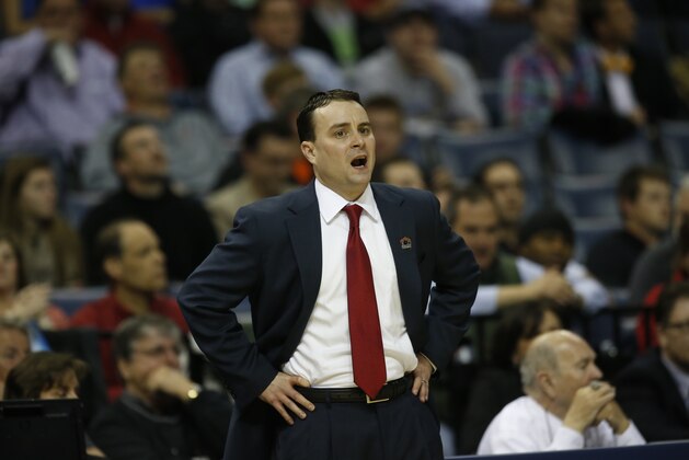 Dayton head coach Archie Miller watches play against Stanford during the first half in a regional semifinal game at the NCAA college basketball tournament, Thursday, March 27, 2014, in Memphis, Tenn. (AP Photo/John Bazemore)