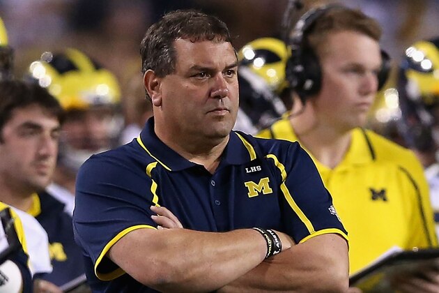 TEMPE, AZ - DECEMBER 28:  Head coach Brady Hoke of the Michigan Wolverines on the sidelines during the Buffalo Wild Wings Bowl against the Kansas State Wildcats at Sun Devil Stadium on December 28, 2013 in Tempe, Arizona.   The Wildcats defeated the Wolverines 31-14.  (Photo by Christian Petersen/Getty Images)