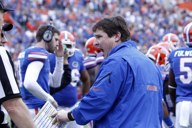 Nov 30, 2013; Gainesville, FL, USA; Florida Gators head coach WIll Muschamp reacts against the Florida State Seminoles during the first quarter at Ben Hill Griffin Stadium. Mandatory Credit: Kim Klement-USA TODAY Sports