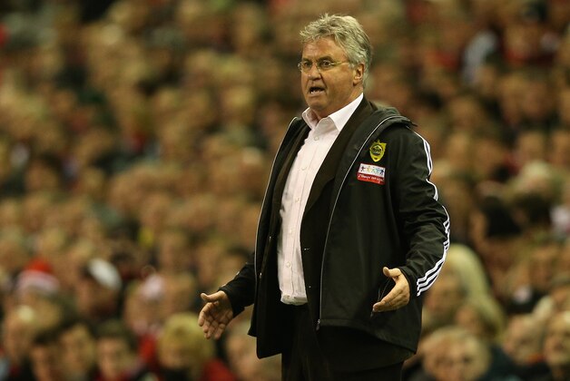 LIVERPOOL, ENGLAND - OCTOBER 25:  FC Anji Makhachkala Head Coach Guus Hiddink reacts during the UEFA Europa League Group A match between Liverpool FC and FC Anzhi Makhachkala at Anfield on October 25, 2012 in Liverpool, England.  (Photo by Clive Brunskill/Getty Images)