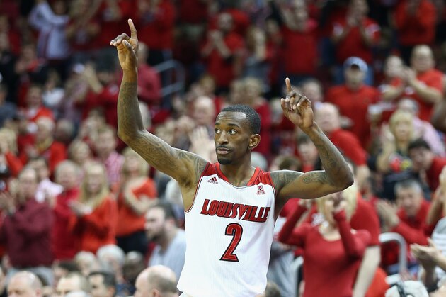 LOUISVILLE, KY - MARCH 08:  Russ Smith #2 of the Louisville Cardinals waves to the crowd after leaving the game for the last time against the Connecticut Huskies at KFC YUM! Center on March 8, 2014 in Louisville, Kentucky.  It was senior day and it was Smith's last home game.  (Photo by Andy Lyons/Getty Images)