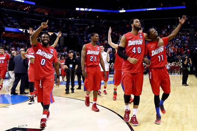 MEMPHIS, TN - MARCH 27:  The Dayton Flyers walk off the floor after defeating the Stanford Cardinal 82-72 in a regional semifinal of the 2014 NCAA Men's Basketball Tournament at the FedExForum on March 27, 2014 in Memphis, Tennessee.  (Photo by Streeter Lecka/Getty Images)