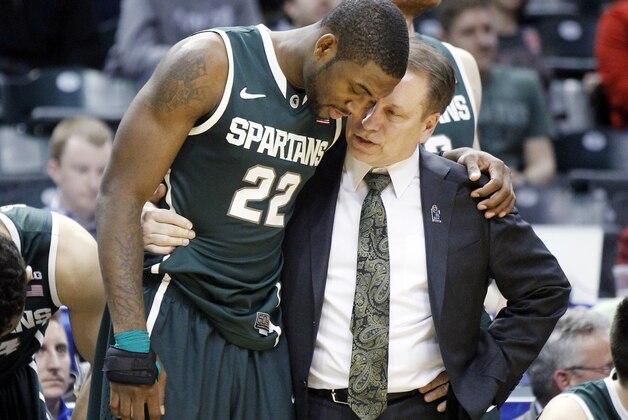 Michigan State head coach Tom Izzo, right, talks to Branden Dawson near the end of the second half of an NCAA college basketball game in the semifinals of the Big Ten Conference tournament Saturday, March 15, 2014, in Indianapolis. Michigan State won 83-75. (AP Photo/Kiichiro Sato)