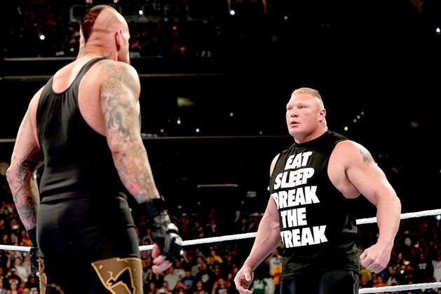Brock and Undertaker stare each other down. Brock and Undertaker stare each other down.