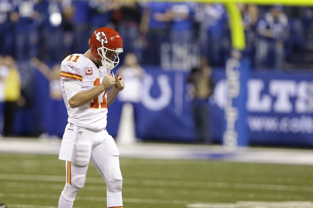 Kansas City Chiefs' Alex Smith (11) reacts after getting sacked and fumbling during the second half of an NFL wild-card playoff football game against the Indianapolis Colts Saturday, Jan. 4, 2014, in Indianapolis. (AP Photo/Michael Conroy)