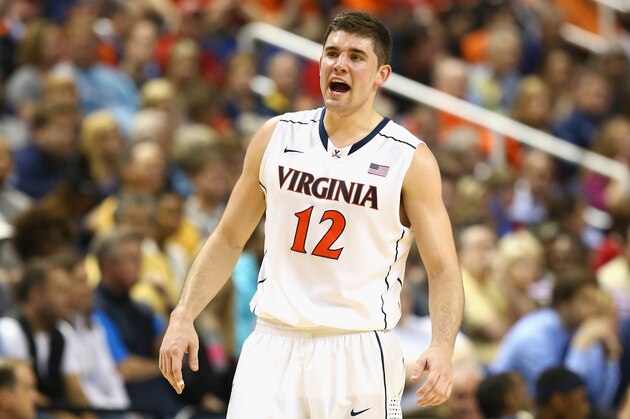 GREENSBORO, NC - MARCH 15:  Joe Harris #12 of the Virginia Cavaliers yells to teammates against the Pittsburgh Panthers during the semifinals of the 2014 Men's ACC Basketball Tournament at Greensboro Coliseum on March 15, 2014 in Greensboro, North Carolina.  (Photo by Streeter Lecka/Getty Images)