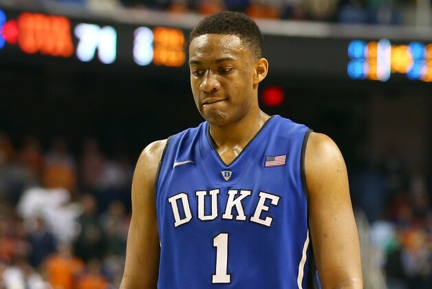 GREENSBORO, NC - MARCH 16:  Jabari Parker #1 of the Duke Blue Devils reacts during their final minutes of their loss to the Virginia Cavaliers in the finals of the 2014 Men's ACC Basketball Tournament at Greensboro Coliseum on March 16, 2014 in Greensboro, North Carolina.  (Photo by Streeter Lecka/Getty Images)