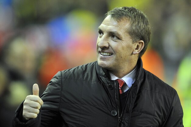 Liverpool's manager Brendan Rodgers gestures during their English Premier League soccer match against Norwich City at Anfield in Liverpool, England, Wednesday Dec. 4, 2013. (AP Photo/Clint Hughes)