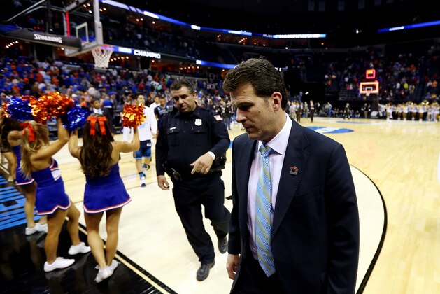 MEMPHIS, TN - MARCH 27: Head coach Steve Alford of the UCLA Bruins walks off the court after losing to the Florida Gators 79-68 in a regional semifinal of the 2014 NCAA Men's Basketball Tournament at the FedExForum on March 27, 2014 in Memphis, Tennessee.  (Photo by Streeter Lecka/Getty Images)