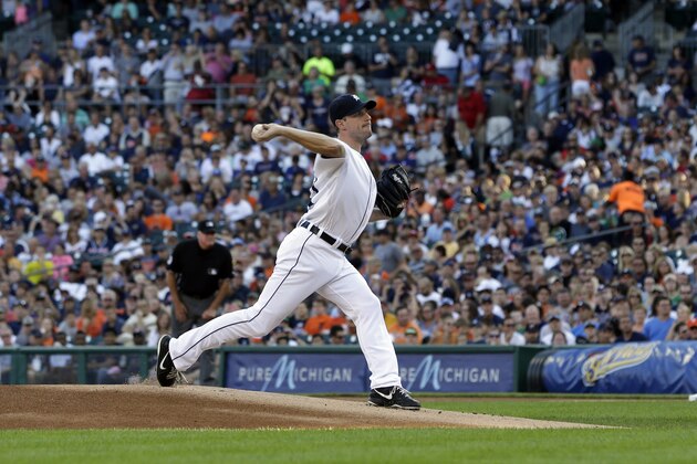 Detroit Tigers starting pitcher Max Scherzer throws during the first inning of a baseball game against the Texas Rangers in Detroit, Saturday, July 13, 2013. (AP Photo/Carlos Osorio)