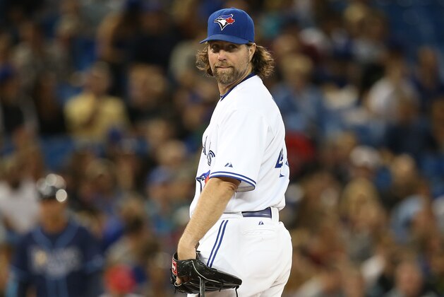 New York Mets starting pitcher R.A. Dickey (43) works in the first inning of a baseball game against the Atlanta Braves Saturday, July, 14, 2012 in Atlanta. (AP Photo/John bazemore)