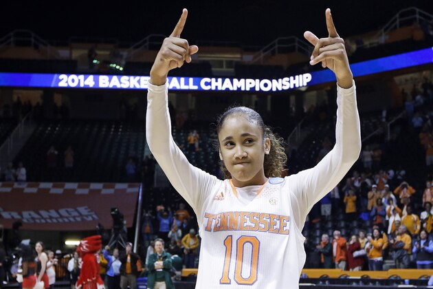 Tennessee guard Meighan Simmons acknowledges the crowd as she leaves the court following a win over St. John's in an NCAA women's college basketball second-round tournament game Monday, March 24, 2014, in Knoxville, Tenn. Simmons scored 17 points as Tennessee won 67-51. (AP Photo/Mark Humphrey)