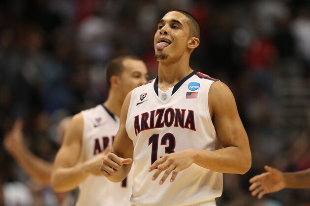 ANAHEIM, CA - MARCH 27:  Nick Johnson #13 of the Arizona Wildcats celebrates in the second half while taking on the San Diego State Aztecs during the regional semifinal of the 2014 NCAA Men's Basketball Tournament at the Honda Center on March 27, 2014 in Anaheim, California.  (Photo by Jeff Gross/Getty Images)