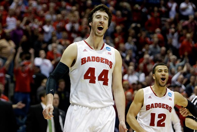 MILWAUKEE, WI - MARCH 22:  Frank Kaminsky #44 and Traevon Jackson #12 of the Wisconsin Badgers celebrate defeating the Oregon Ducks during the third round of the 2014 NCAA Men's Basketball Tournament at BMO Harris Bradley Center on March 22, 2014 in Milwaukee, Wisconsin.  (Photo by Mike McGinnis/Getty Images)