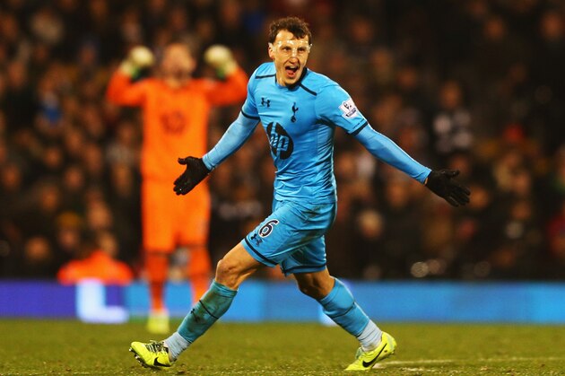 LONDON, ENGLAND - DECEMBER 04:  Vlad Chiriches of Tottenham Hotspur celebrates equalising during the Barclays Premier League match between Fulham and Tottenham Hotspur at Craven Cottage on December 4, 2013 in London, England.  (Photo by Paul Gilham/Getty Images)