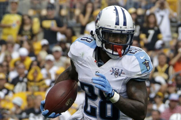 Tennessee Titans running back Chris Johnson (28) runs during the third quarter of an NFL football game against the Pittsburgh Steelers in Pittsburgh, Sunday, Sept. 8, 2013. The Titans won 16-9. (AP Photo/Gene J. Puskar)