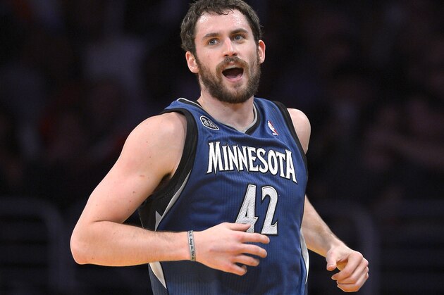 Minnesota Timberwolves forward Kevin Love looks on after scoring during the first half of an NBA basketball game against the Los Angeles Lakers, Sunday, Nov. 10, 2013, in Los Angeles. (AP Photo/Mark J. Terrill)