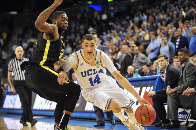 February 27, 2014; Los Angeles, CA, USA; UCLA Bruins guard Zach LaVine (14) moves the ball against the Oregon Ducks during the overtime period at Pauley Pavilion. Mandatory Credit: Gary A. Vasquez-USA TODAY Sports