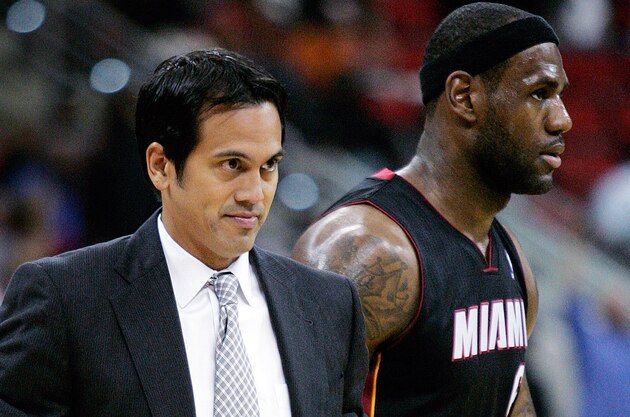 Oct 23, 2012; Raleigh, NC, USA; Miami Heat head coach Erik Spoelstra and small forward LeBron James (6) during a timeout against the Charlotte Bobcats in the first half at PNC Arena. Mandatory Credit: Mark Dolejs-USA TODAY Sports