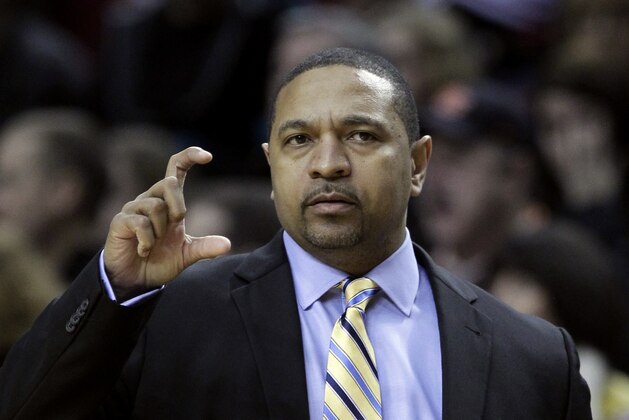 Golden State Warriors coach Mark Jackson signals from the bench during the first half of an NBA basketball game against the Portland Trail Blazers in Portland, Ore., Sunday, March 16, 2014. (AP Photo/Don Ryan)