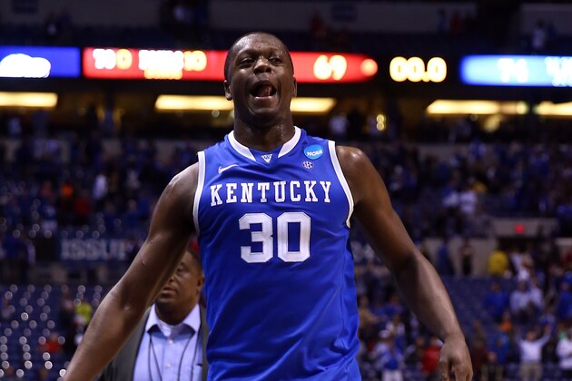 INDIANAPOLIS, IN - MARCH 28:  Julius Randle #30 of the Kentucky Wildcats celebrates defeating the Louisville Cardinals 74 to 69 during the regional semifinal of the 2014 NCAA Men's Basketball Tournament at Lucas Oil Stadium on March 28, 2014 in Indianapolis, Indiana.  (Photo by Andy Lyons/Getty Images)