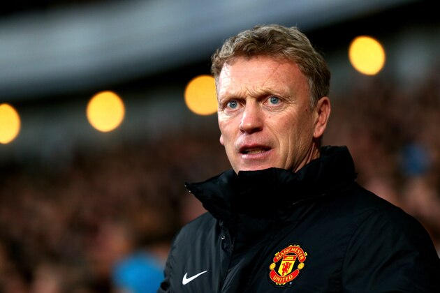 LONDON, ENGLAND - MARCH 22:  David Moyes the Manchester United manager looks on during the Barclays Premier League match between West Ham United and Manchester United at Boleyn Ground on March 22, 2014 in London, England.  (Photo by Paul Gilham/Getty Images)