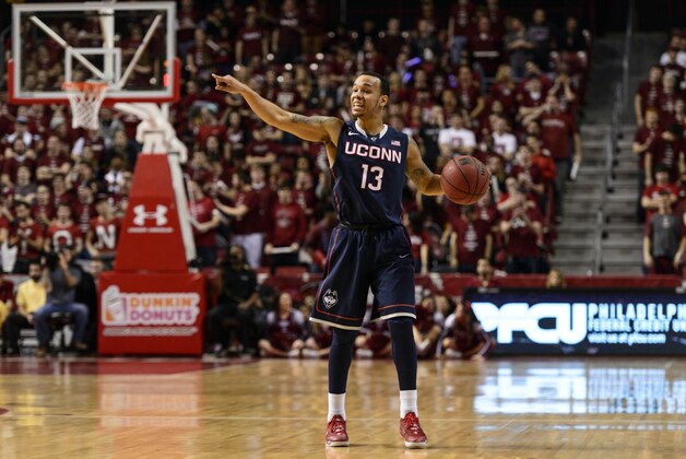 Feb 20, 2014; Philadelphia, PA, USA; Connecticut Huskies guard Shabazz Napier (13) sets up a play during the first half against the Temple Owls at the Liacouras Center. UCONN defeated Temple 68-55. Mandatory Credit: Howard Smith-USA TODAY Sports